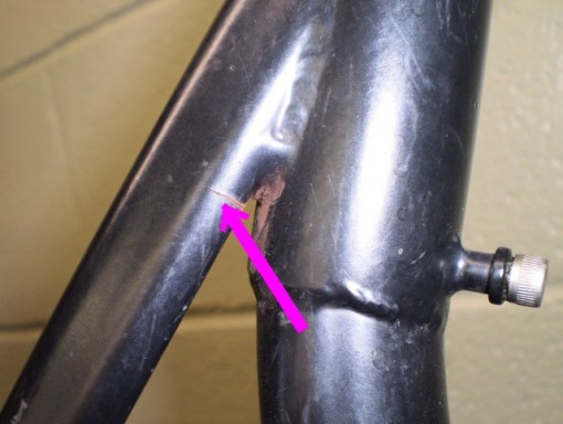 Potential crack site #1. The crack area is usually right below where the straight leg of the seat mast begins. This picture shows a crack there. We will be sending a special brace that can be easily installed on your tikit to prevent any crack forming in the future. 